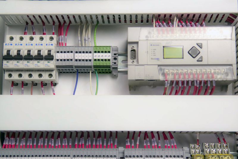 Industrial Automation Control Panel Interior view with PLC Programmable Logic Controller